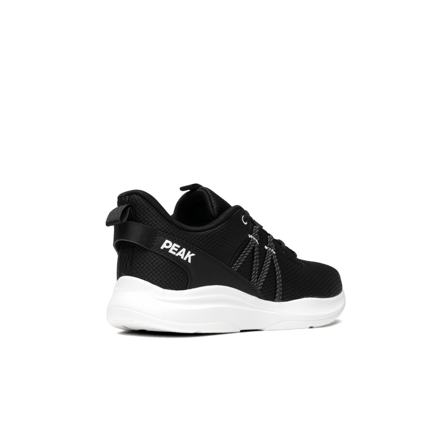 PEAK Dynalight shoes in black and white for women, rear view highlighting the heel design and breathable upper