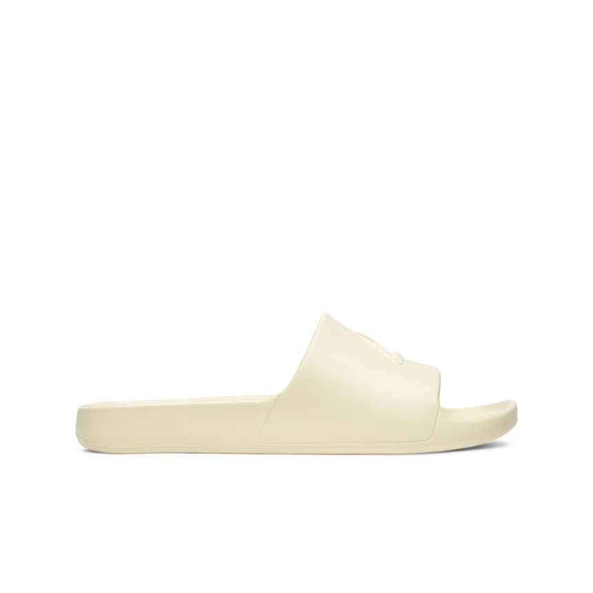 Sandales Peak unisex coloris beige, design minimaliste et semelle épaisse antidérapante. Légères et confortables, elles offrent un excellent amorti pour une utilisation quotidienne, à la maison ou à la plage