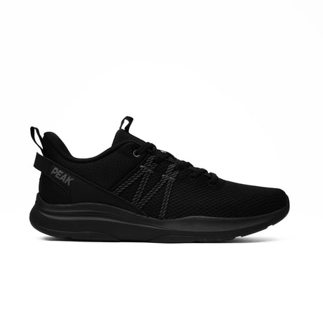 Sneakers Peak pour homme en noir intégral, design minimaliste et moderne, avec tige en maille respirante et semelle légère pour le running et un usage quotidien