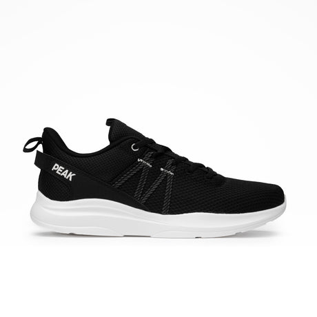 Sneakers Peak pour homme en noir et blanc, design sportif et minimaliste, avec maille respirante et semelle légère offrant confort et maintien pour le running et la marche quotidienne