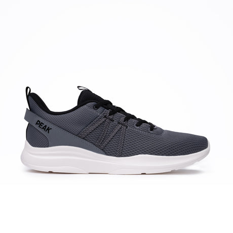 Sneakers Peak pour homme en gris Paloma Ash, au design moderne et minimaliste, dotée d’une maille respirante et d’une semelle légère pour un confort optimal lors du running ou des activités quotidiennes.