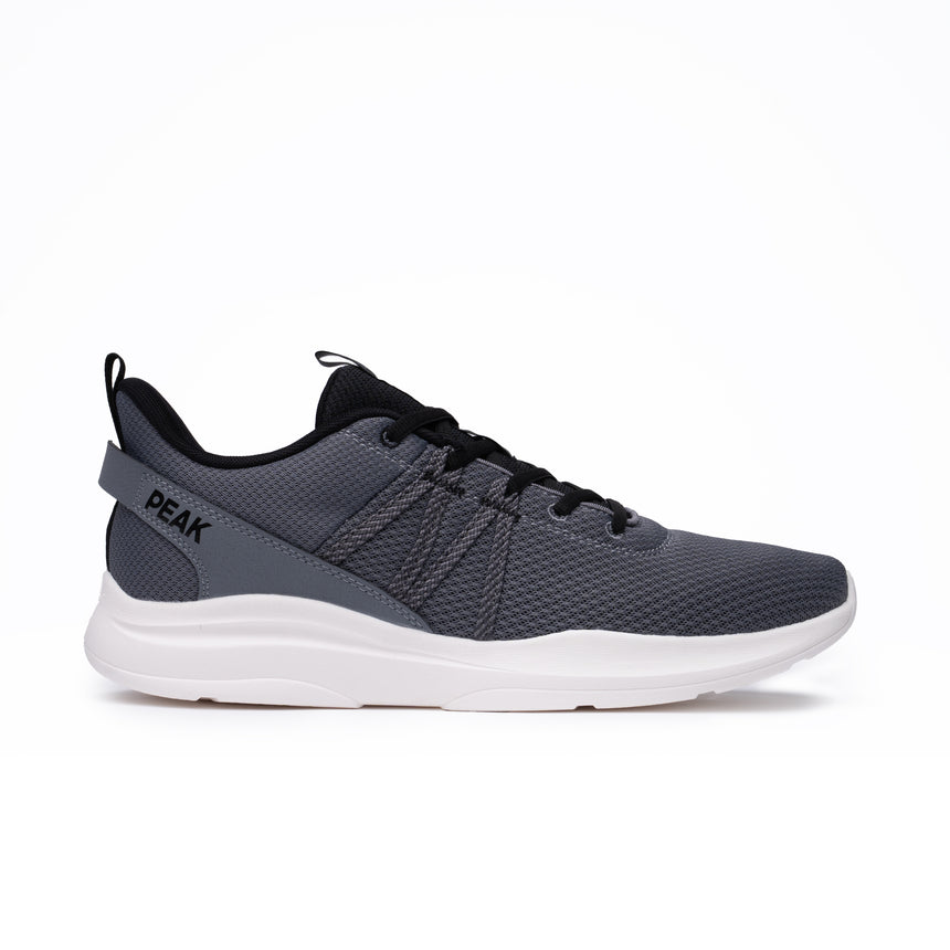 Sneakers Peak pour homme en gris Paloma Ash, au design moderne et minimaliste, dotée d’une maille respirante et d’une semelle légère pour un confort optimal lors du running ou des activités quotidiennes.