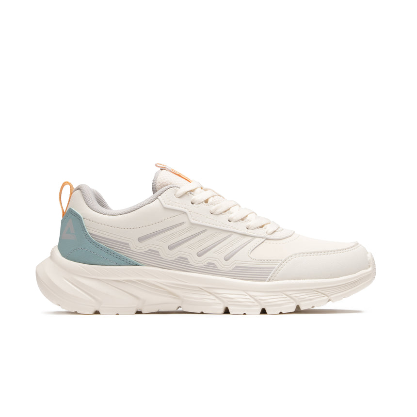Sneakers Peak Urban Glide pour femme, coloris beige avec détails bleu pastel et touche orange. Design moderne, semelle épaisse et tige respirante pour un confort optimal au quotidien.