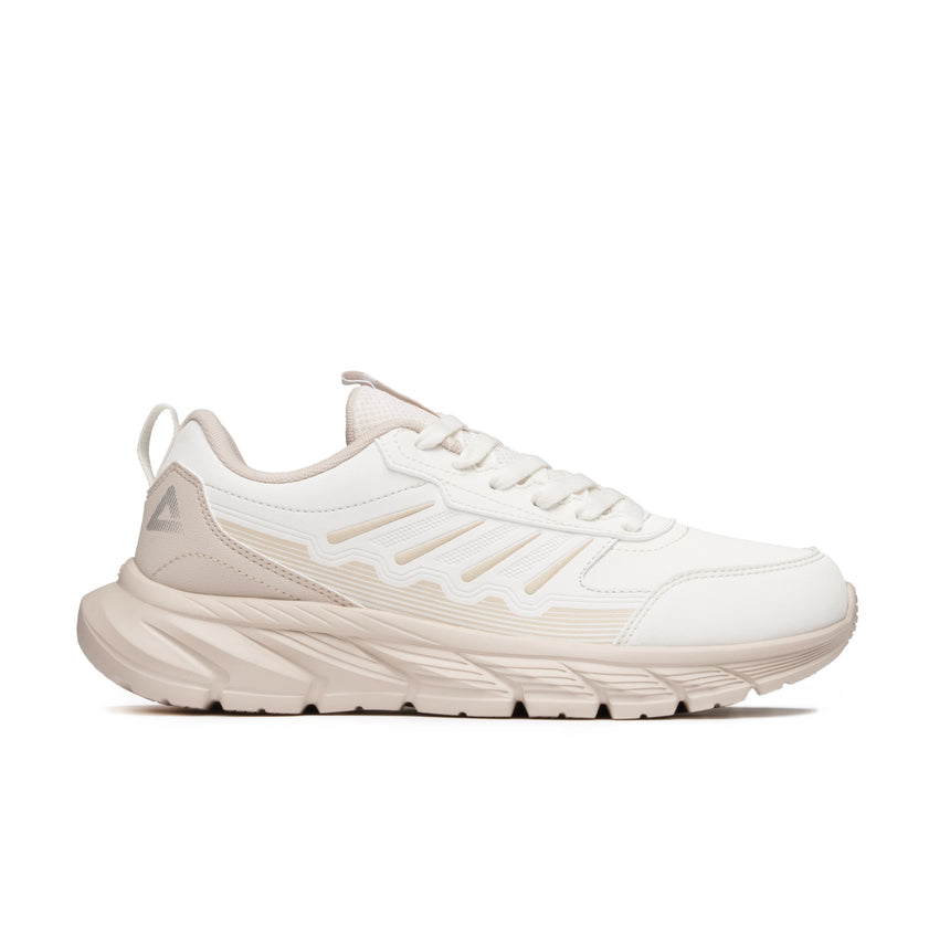 Sneakers Peak Urban Glide pour femme, coloris beige clair, avec semelle épaisse sculptée et tige en maille respirante. Chaussure confortable et tendance pour un style urbain moderne.