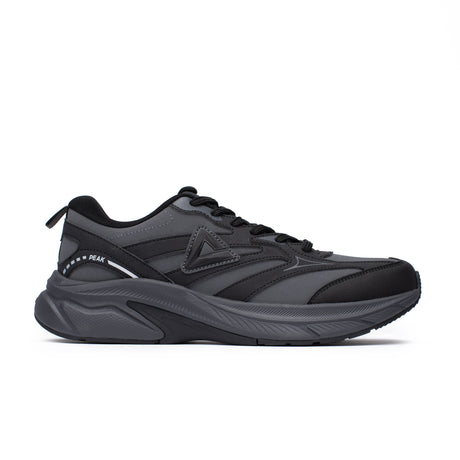 Sneakers Peak  pour homme, coloris gris et noir, avec semelle épaisse et design audacieux. Chaussure confortable et stylée pour un look moderne.