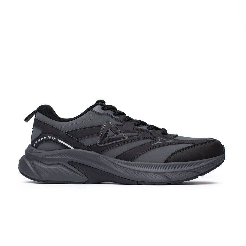 Sneakers Peak  pour homme, coloris gris et noir, avec semelle épaisse et design audacieux. Chaussure confortable et stylée pour un look moderne.