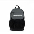 Black and grey PEAK backpack with 'UNDERGROUND' text on the front flap and buckle straps, displayed on a clean white background