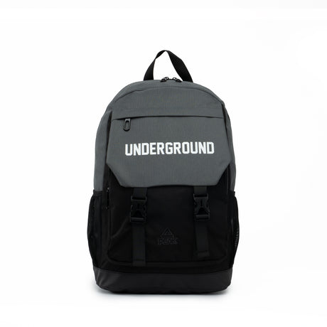 Black and grey PEAK backpack with 'UNDERGROUND' text on the front flap and buckle straps, displayed on a clean white background