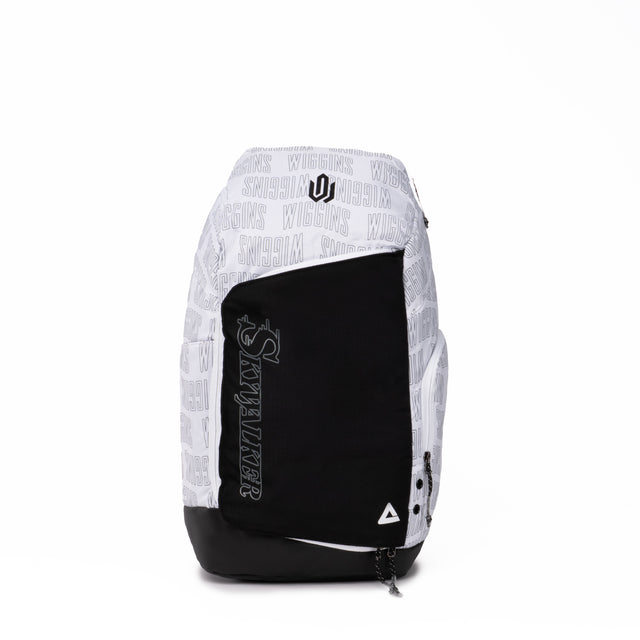 White and black PEAK backpack featuring 'Skywalker' text on the front pocket, Wiggins print pattern across the top section, and triangular PEAK logo at the bottom, displayed on a clean white background