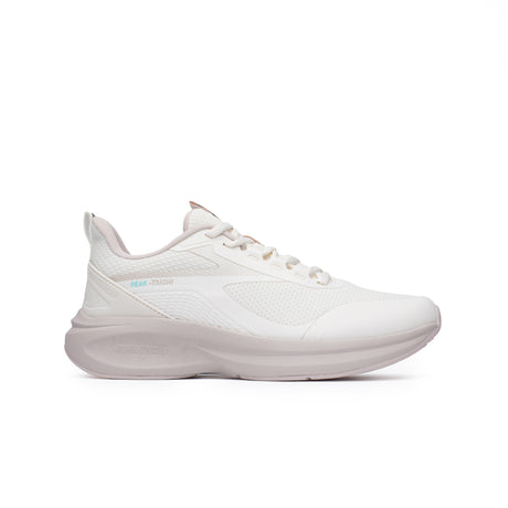 Sneakers Peak Taichi Flow pour femme, coloris blanc cassé, avec semelle Taichi pour un confort optimal. Chaussure légère, élégante et respirante, idéale pour un usage quotidien.