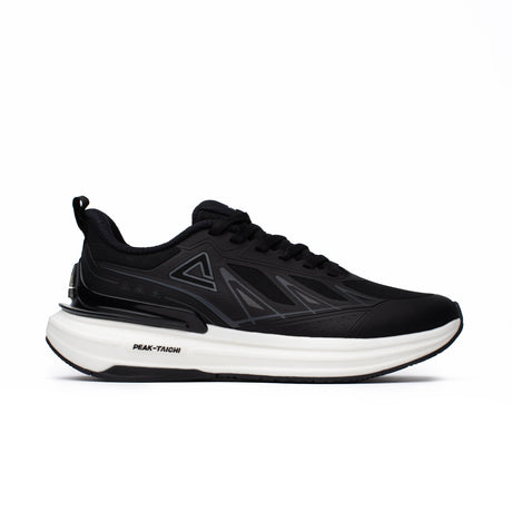 Sneakers Peak Taichi pour homme, coloris noir et blanc, dotée de la technologie Taichi pour un confort dynamique. Chaussure légère, amortissante et élégante.
