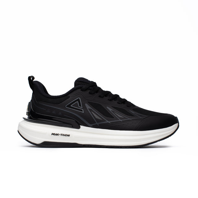 Sneakers Peak Taichi pour homme, coloris noir et blanc, dotée de la technologie Taichi pour un confort dynamique. Chaussure légère, amortissante et élégante.